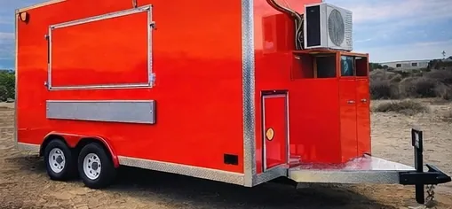 Remolque rojo anaranjado con ventana de servicio y lanza de arrastre