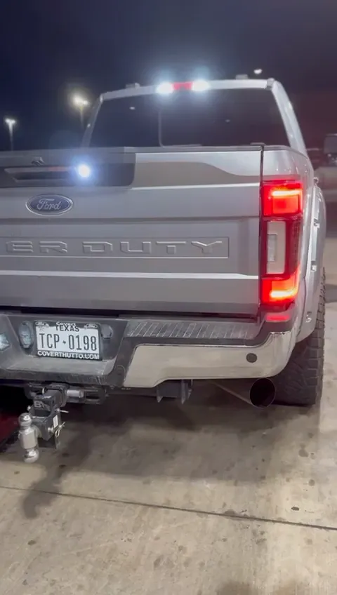 Video: rear of a Ford Super Duty at night with the taillights on